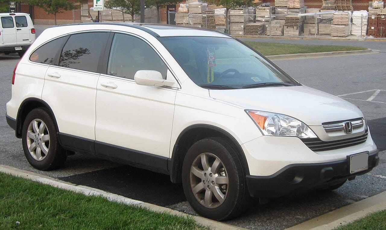 White 2007 to 2009 Honda CR-V EX compact SUV parked in a lot