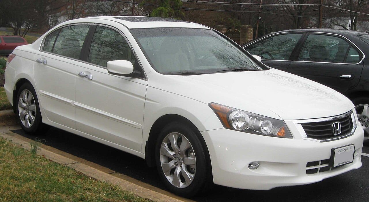 White 2008 to 2009 Honda Accord EX sedan parked beside a curb