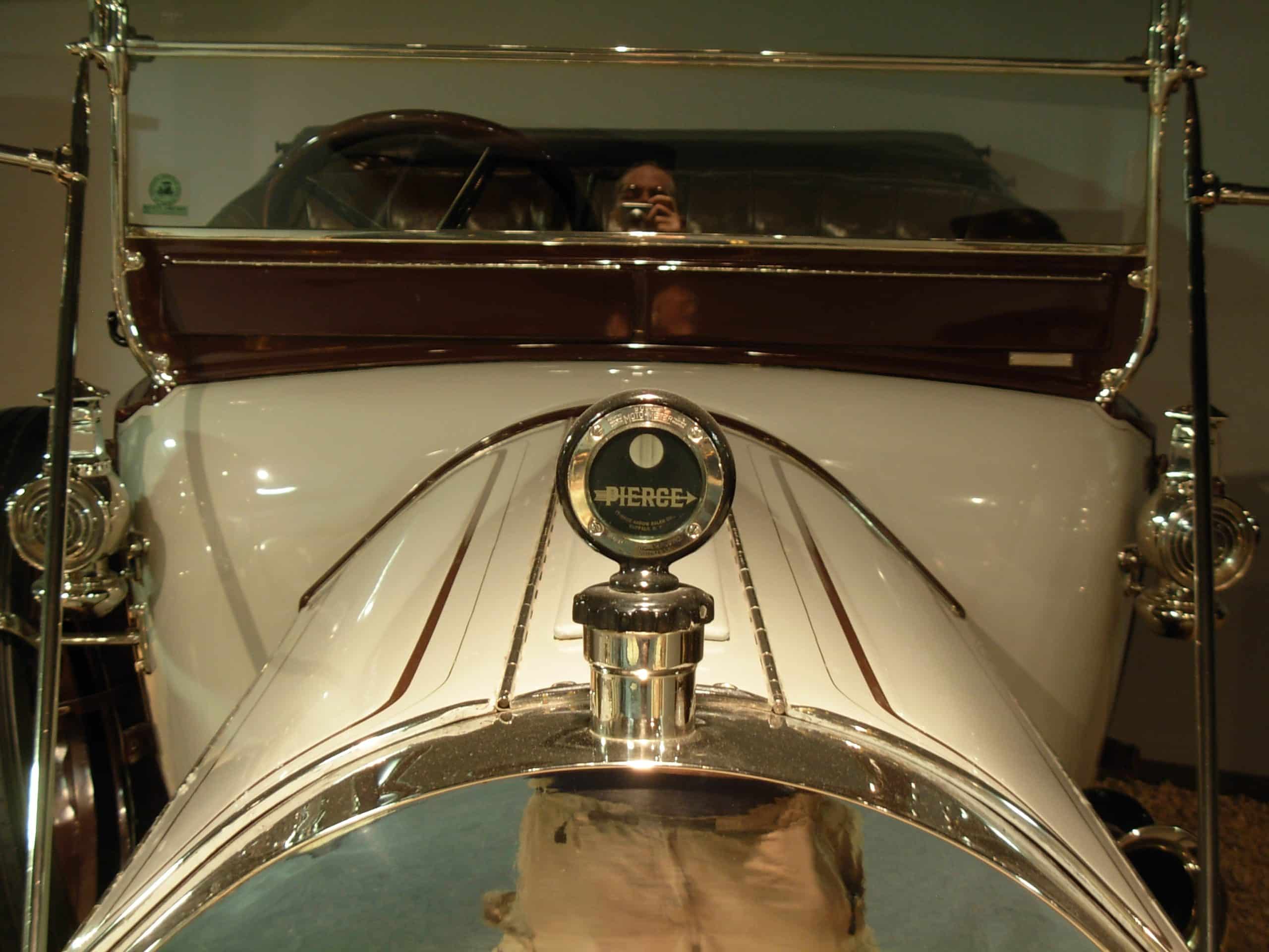 Black 1913 Pierce-Arrow Model 66-A-1 seven-passenger touring car in a museum