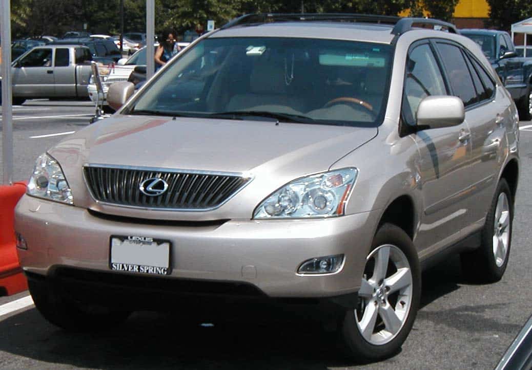 Silver 2004 to 2007 Lexus RX luxury crossover photographed in a parking lot