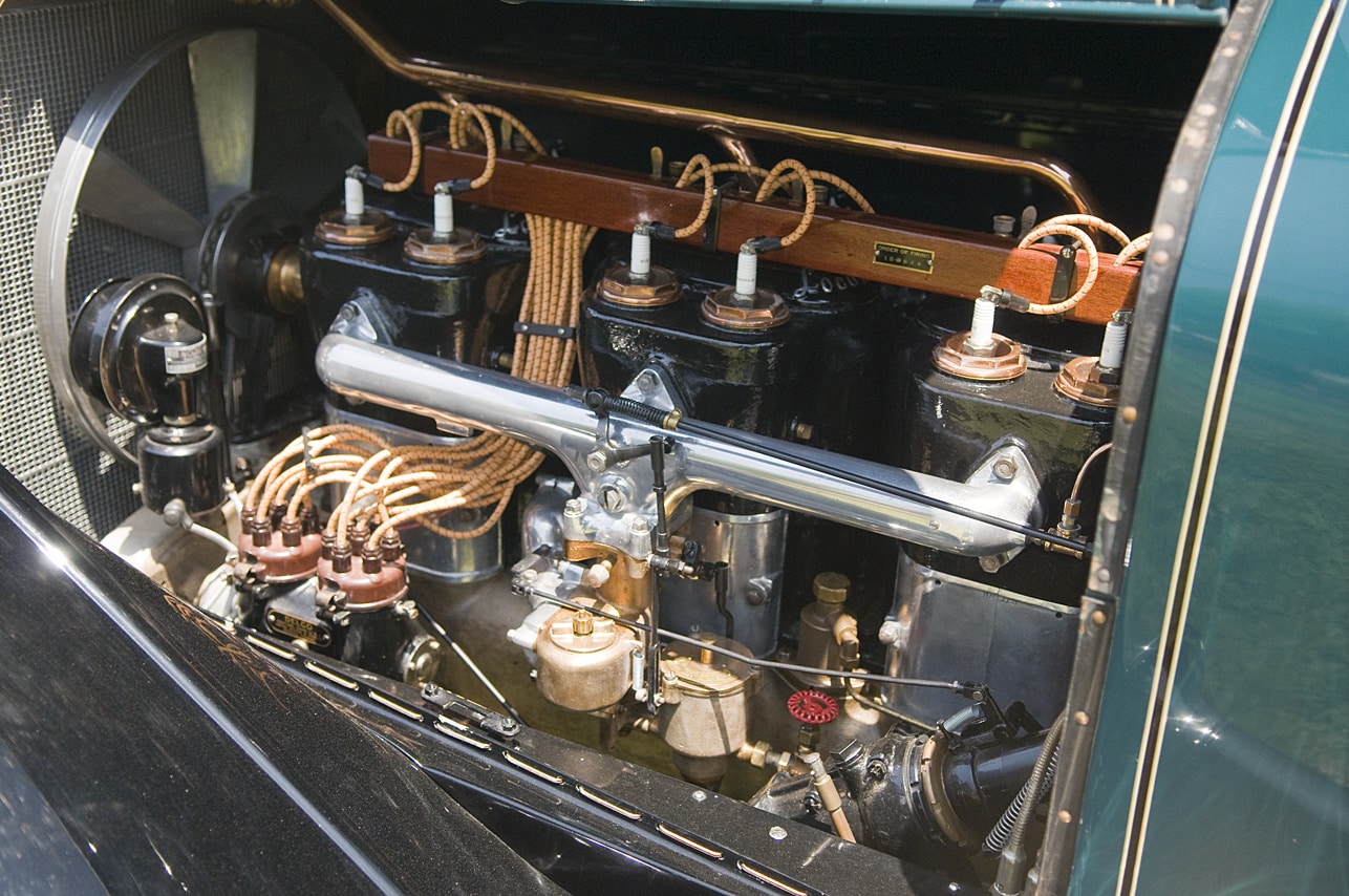 Exposed six-cylinder Locomobile engine in a museum display