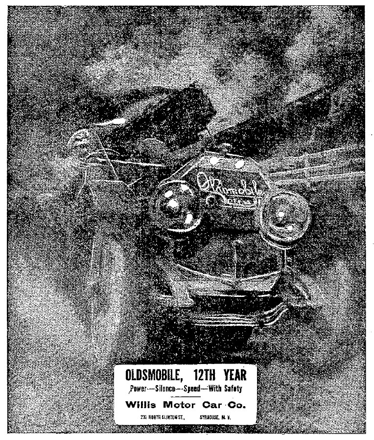 1910 Oldsmobile Limited advertisement showing the car racing alongside a train