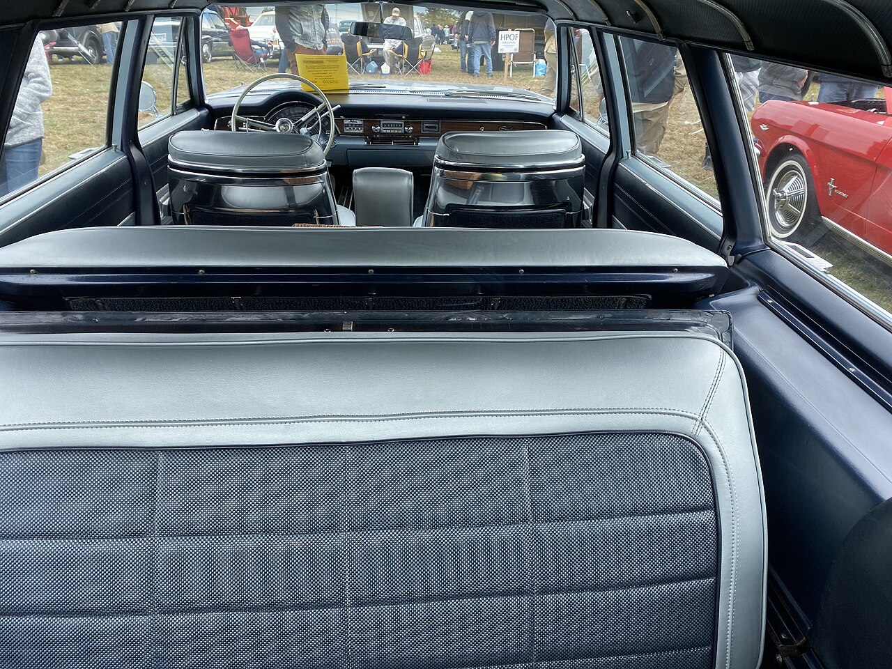Interior of a 1966 Chrysler Town & Country station wagon viewed from the rear