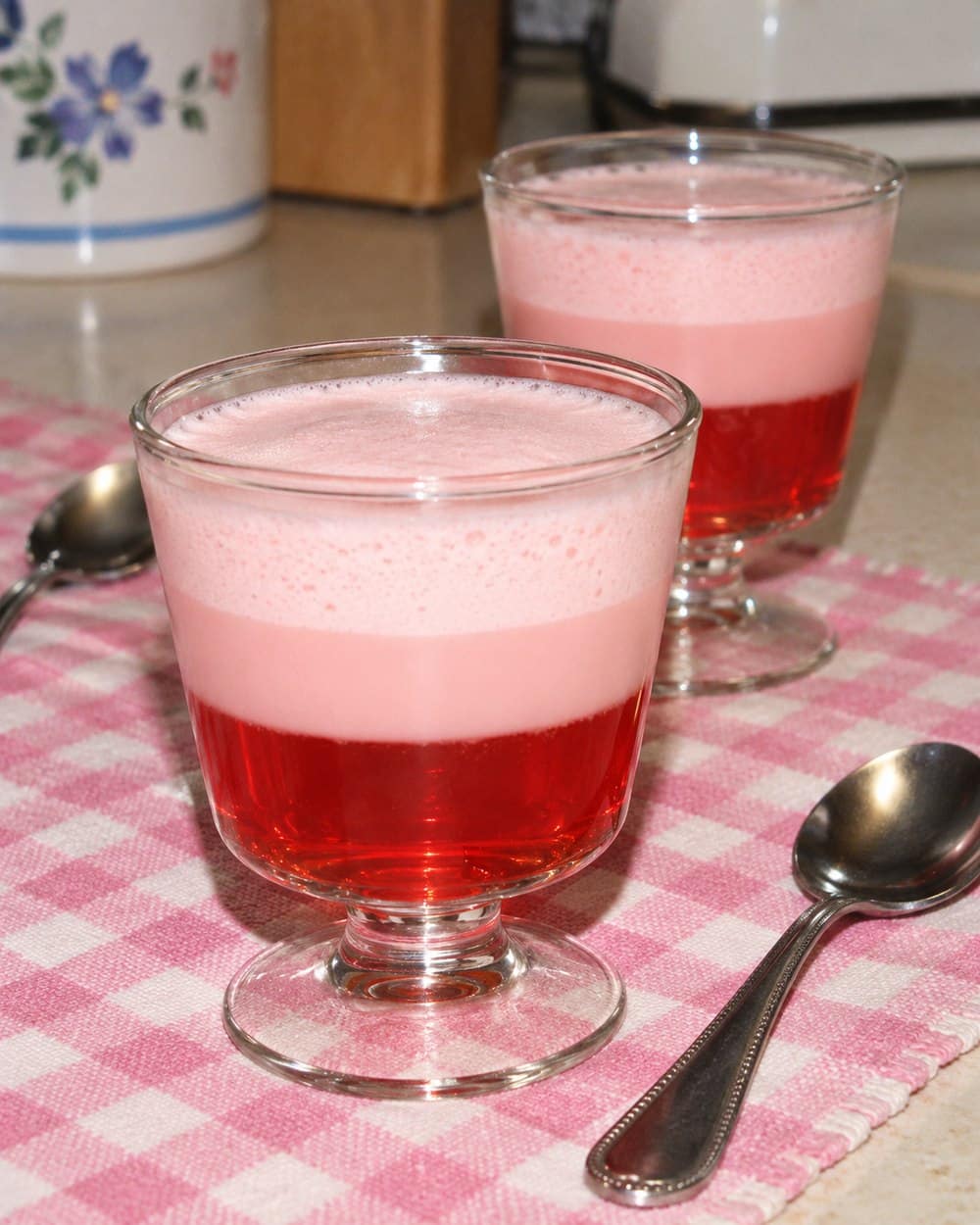 Three-layer Jell-O 1-2-3 dessert in clear glasses