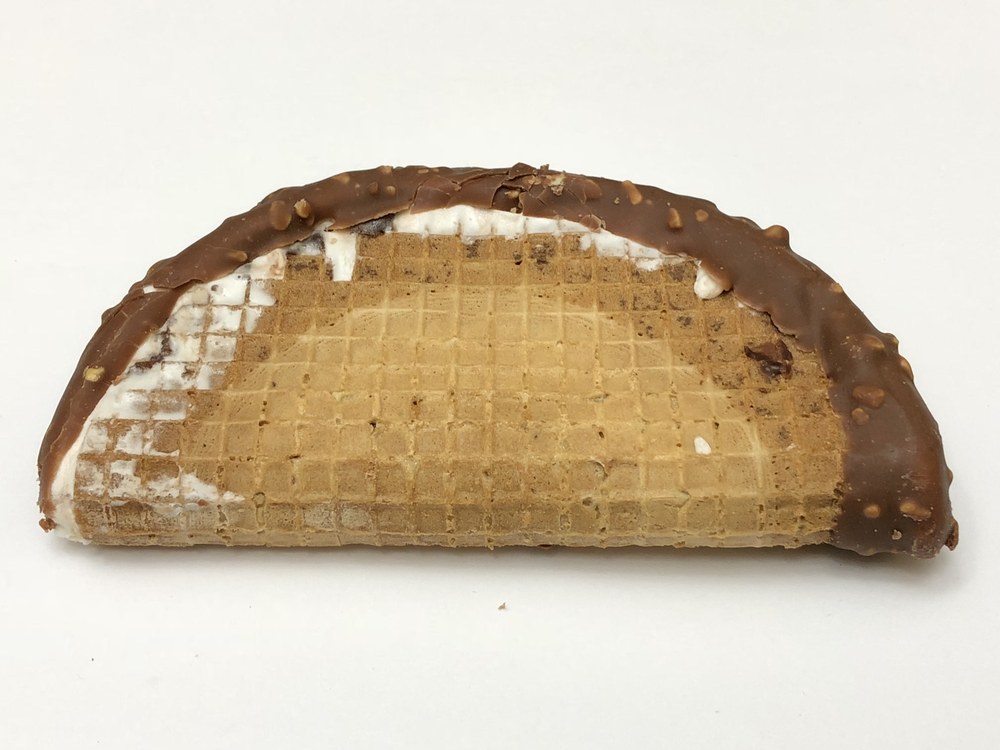 Unwrapped Choco Taco showing the waffle shell and chocolate coating