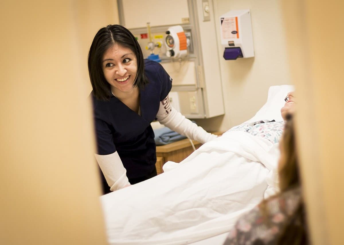 A certified nursing assistant student practices patient care at Truckee Meadows Community College
