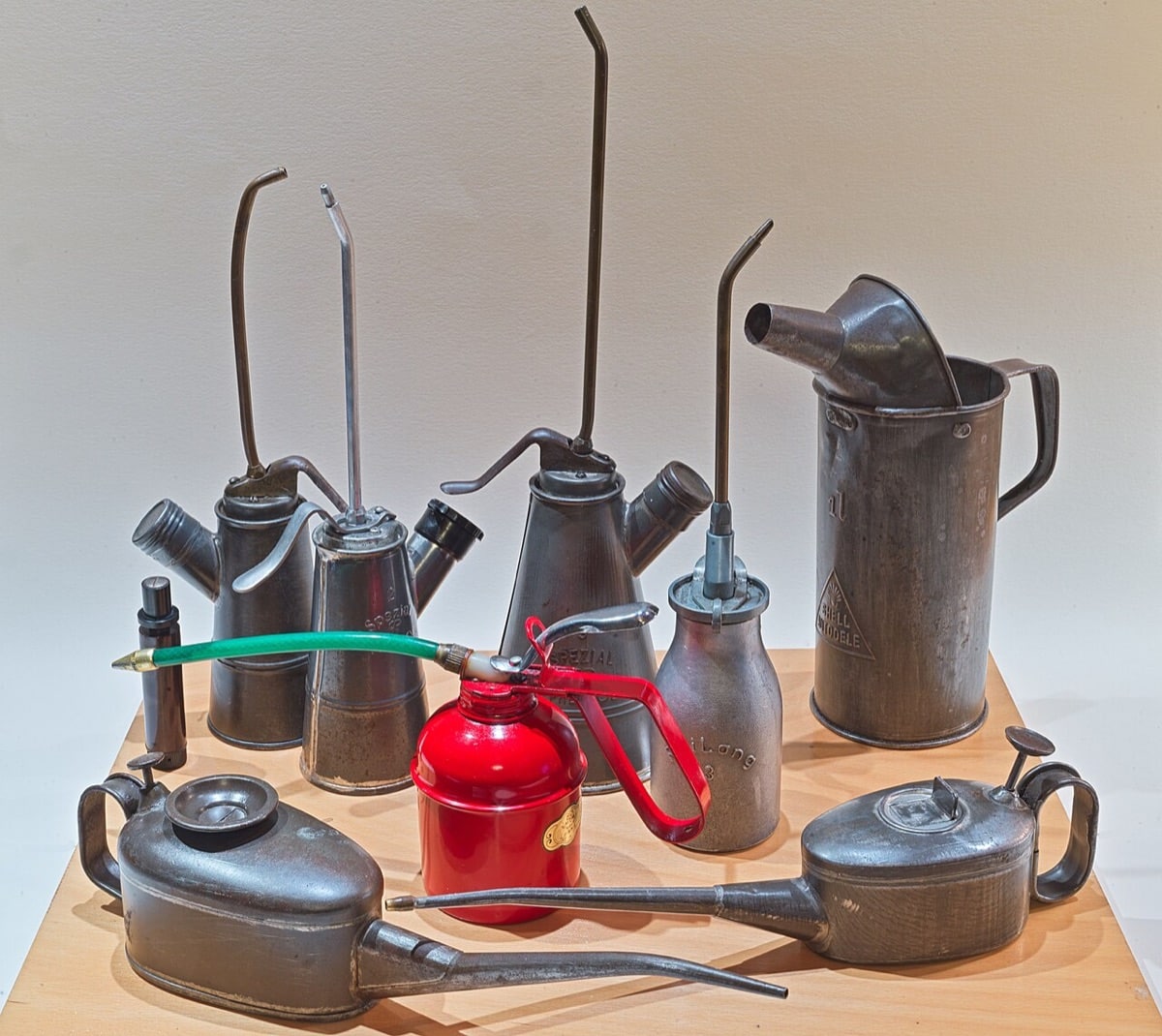 Assorted early twentieth-century metal oilers with long spouts