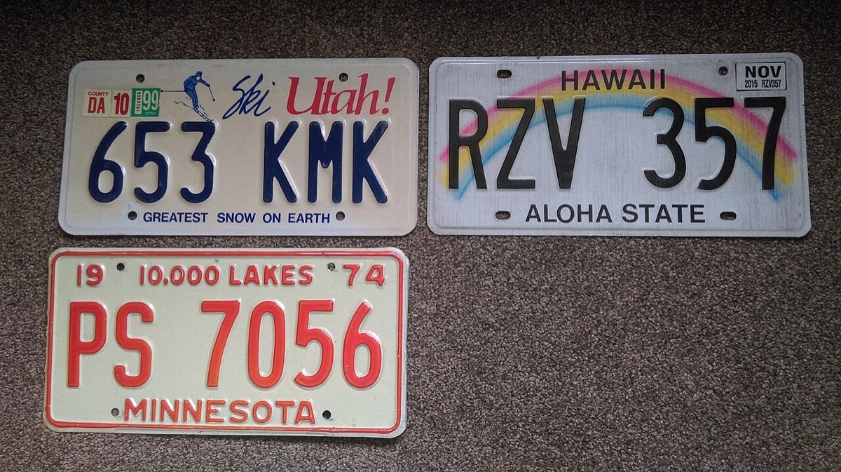 Old license plates from Utah, Hawaii, and Minnesota