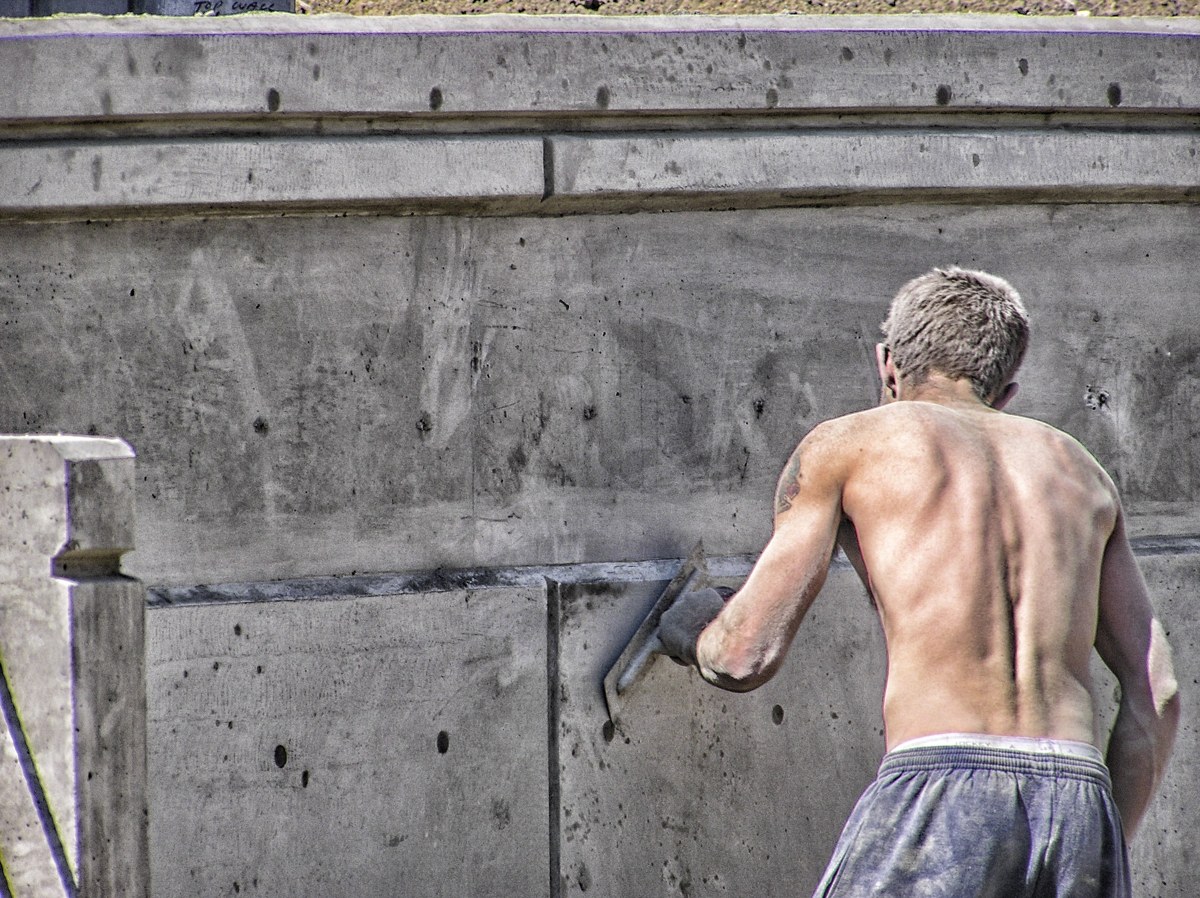 Concrete finisher working on a wall in Juneau, Alaska