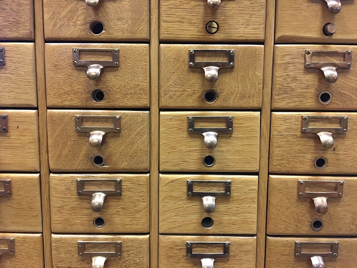 Wooden library card-catalog drawers