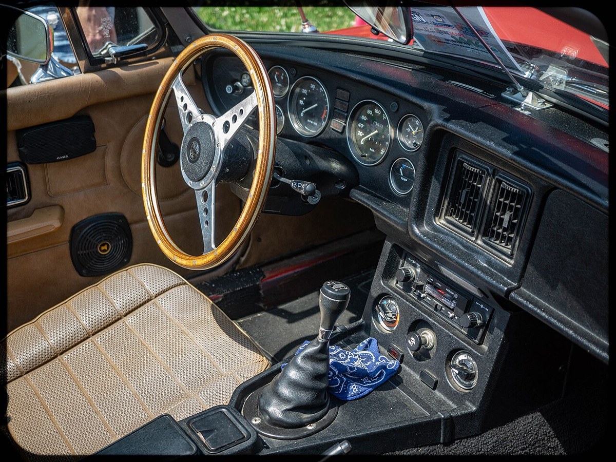 Analog instrument dials in the dashboard of an MGB