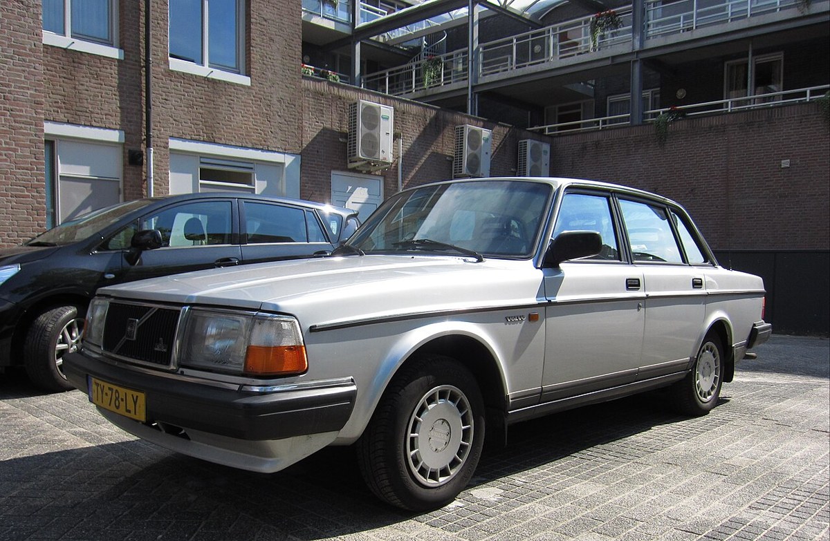 Black bumper trim and side moldings on a Volvo 240 sedan