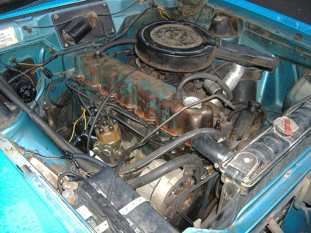 Accessible engine compartment of a 1975 AMC Hornet with a 232 inline-six