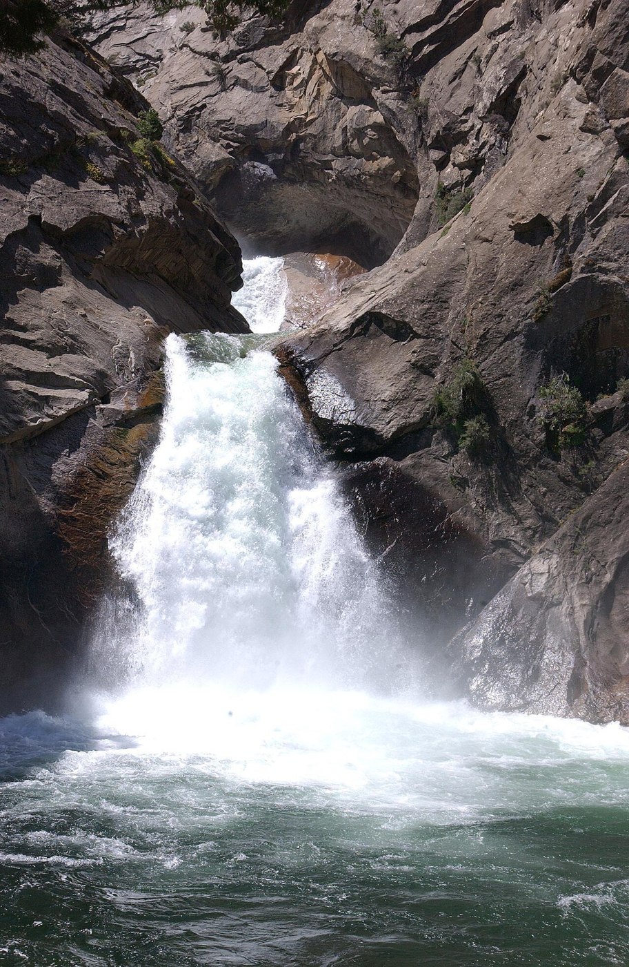 Roaring River Falls pouring through a granite chute
