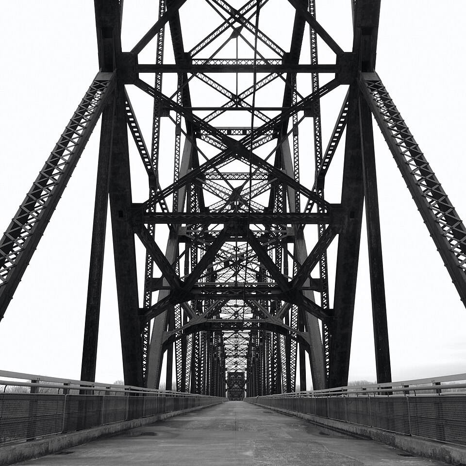 The old steel crossing stretches across the Mississippi, its driving days replaced by a slower pace.