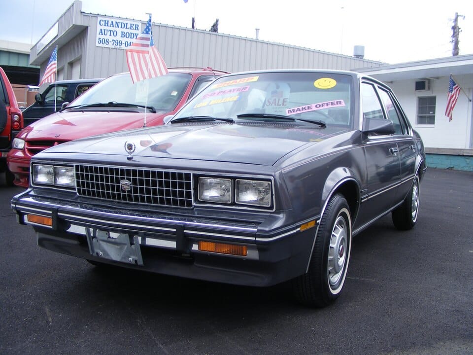 Front and side of a gray 1982 Cadillac Cimarron