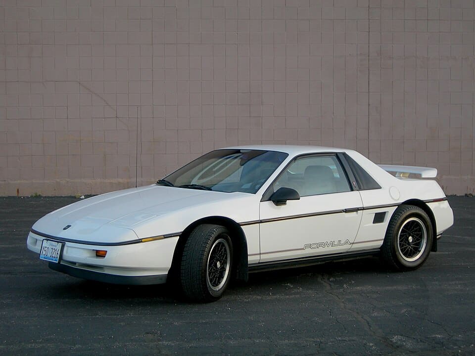 White 1988 Pontiac Fiero Formula viewed from the front and driver side