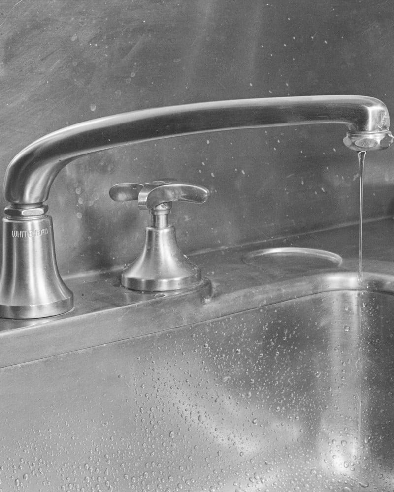 A leaking household faucet photographed in November 1942.
